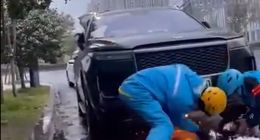 一理想ONE车头底部起火 两外卖小哥就地取雪帮灭