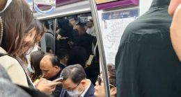 王传福夫妇坐地铁参加北京车展被偶遇